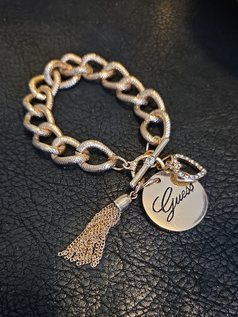 Vintage Guess Gold-Tone Textured Chain Bracelet with Signature Disc and Tassel